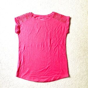 T-shirt, coral/pink, lace accents on shoulders. 
Fits girls 10/12 or women XS.